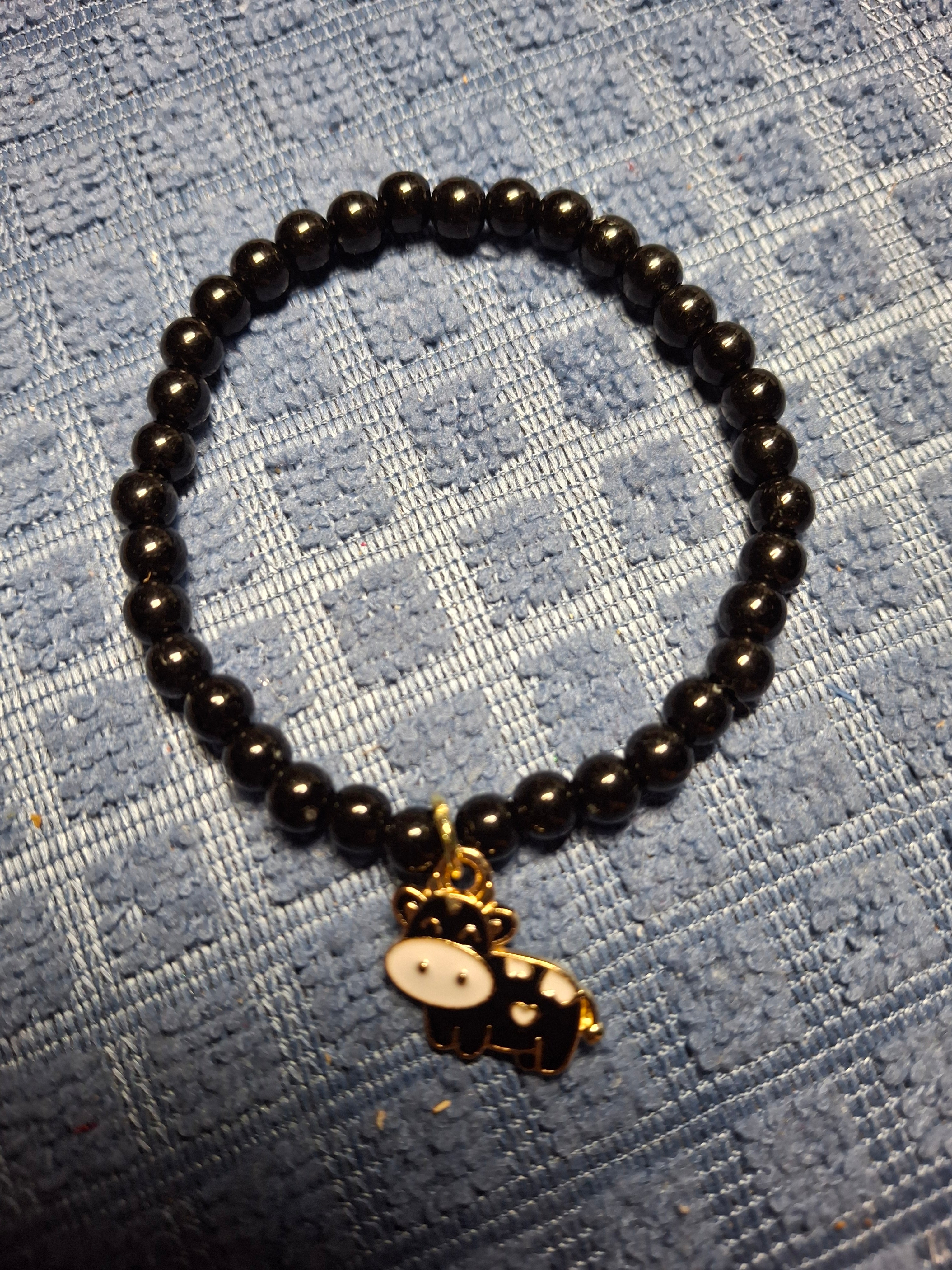 Black Round Bead Bracelet with Black Cow Charm
