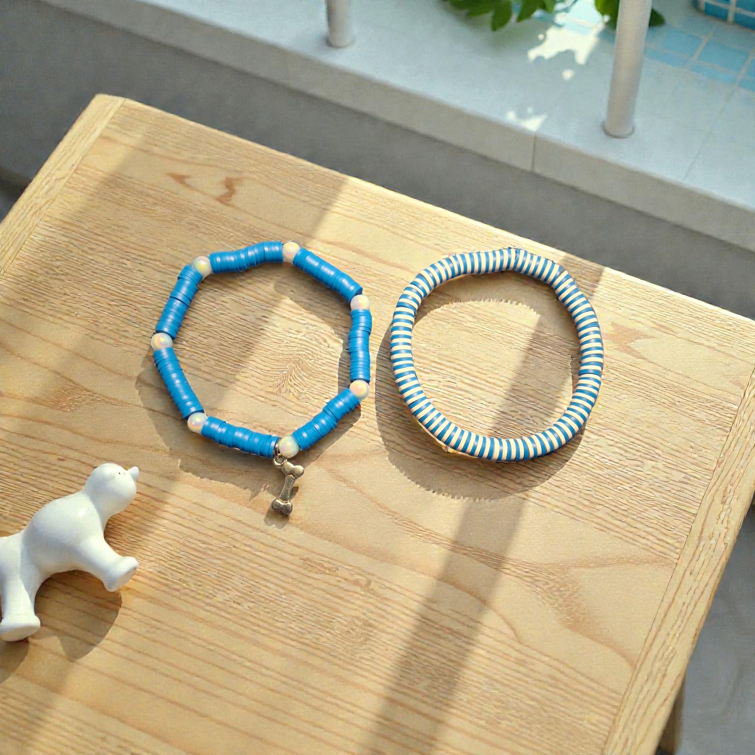 Light Blue and White Clay Bracelet with Bone Charm
