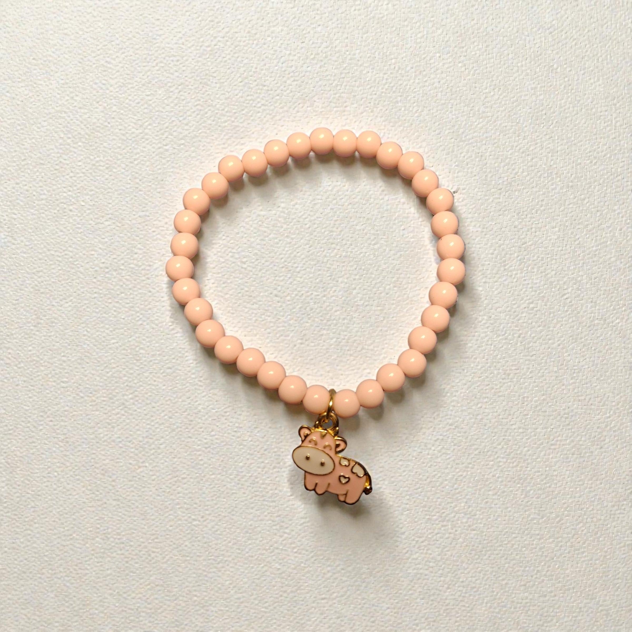Pink Round Bead Bracelet with Pink Cow Charm
