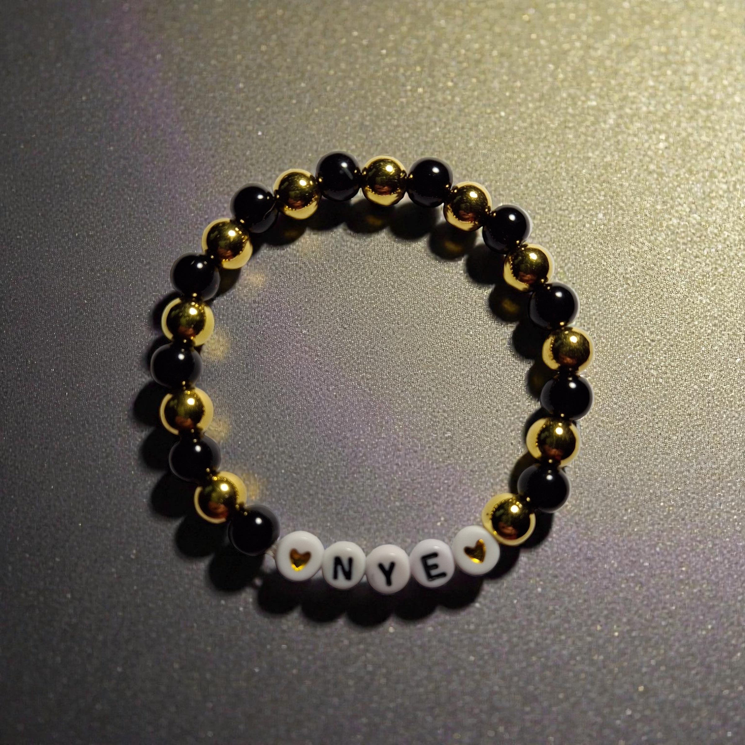 NYE Bracelet with BLK Lettering