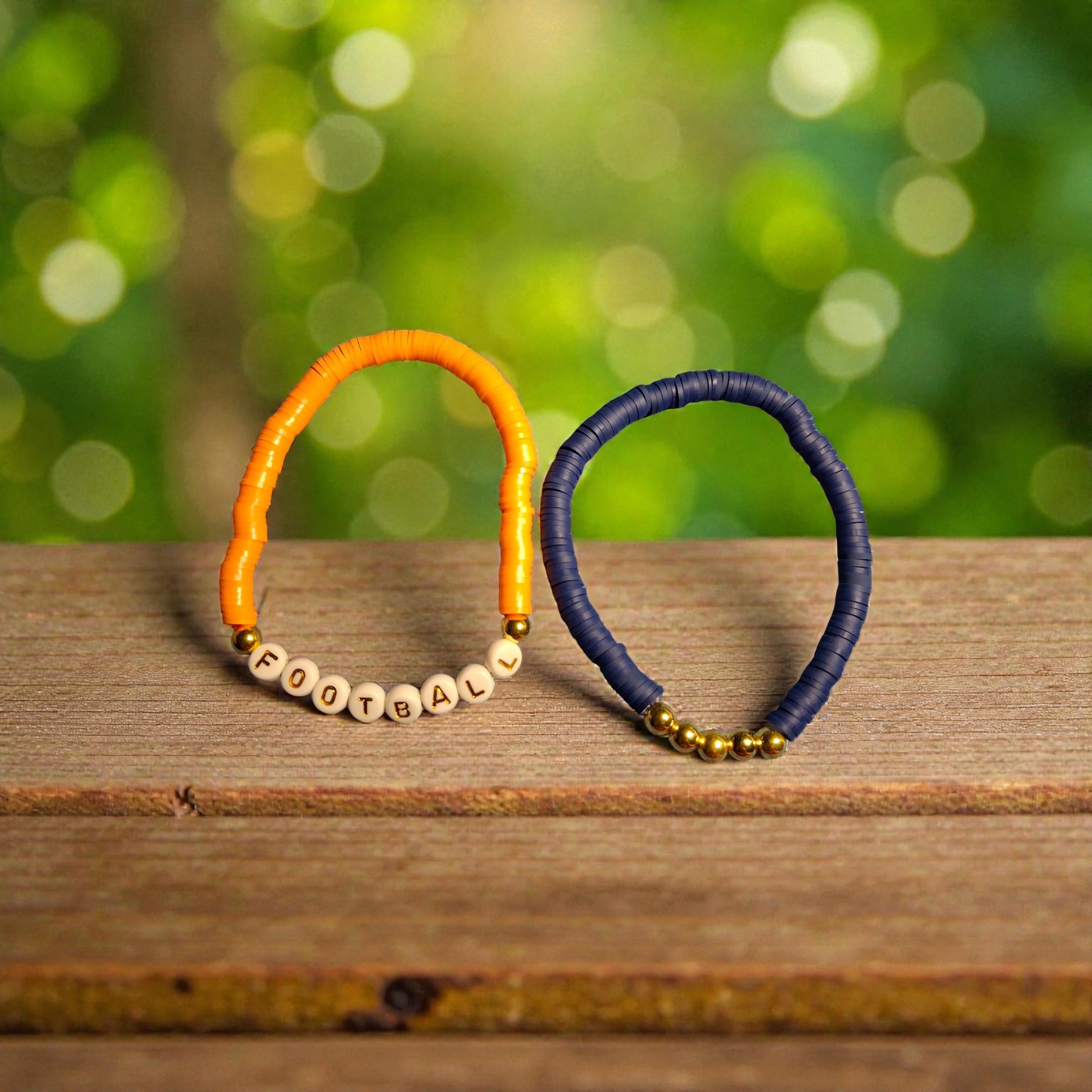 2 Bracelets, 1 orange and 1 blue