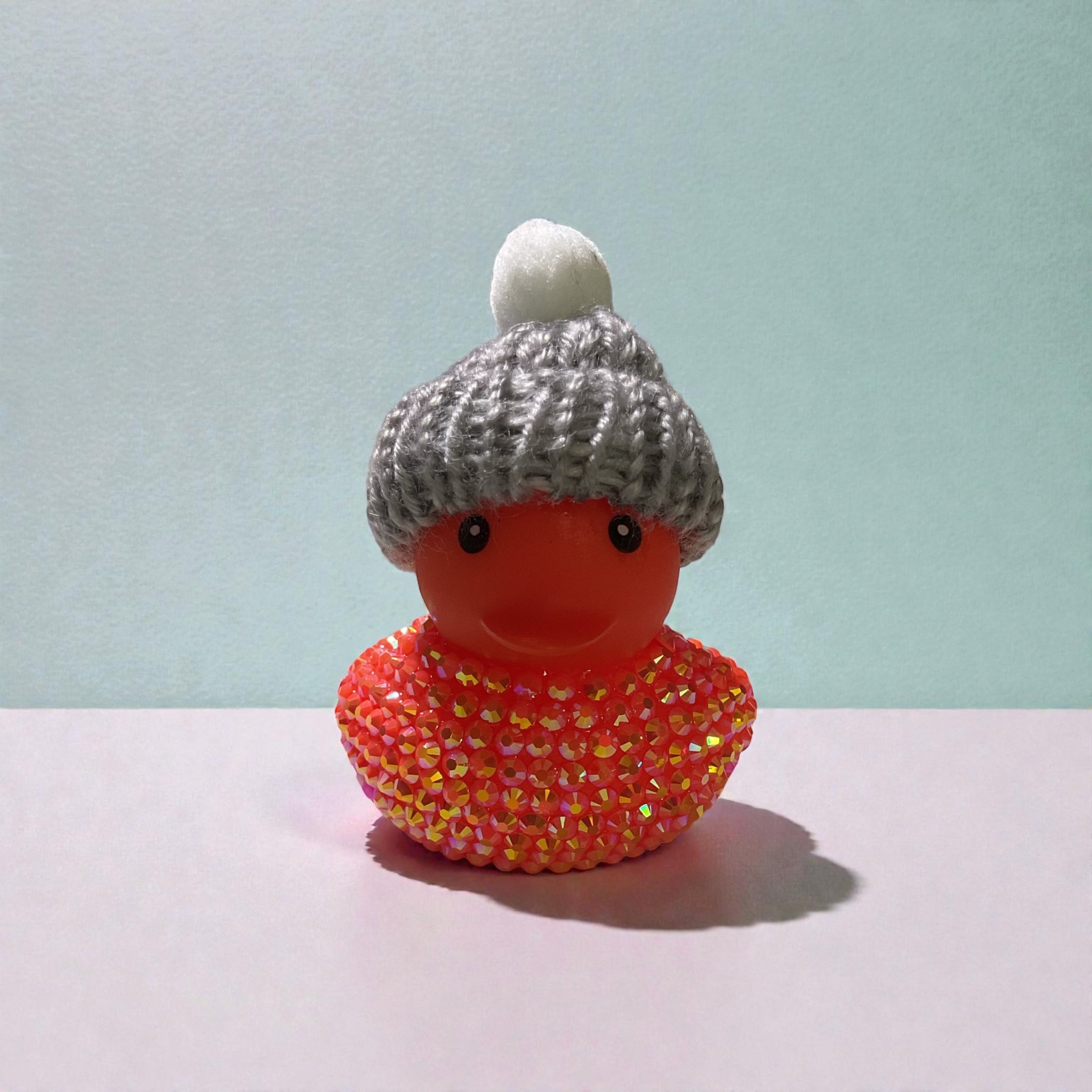 Orange Duck with Grey Hat