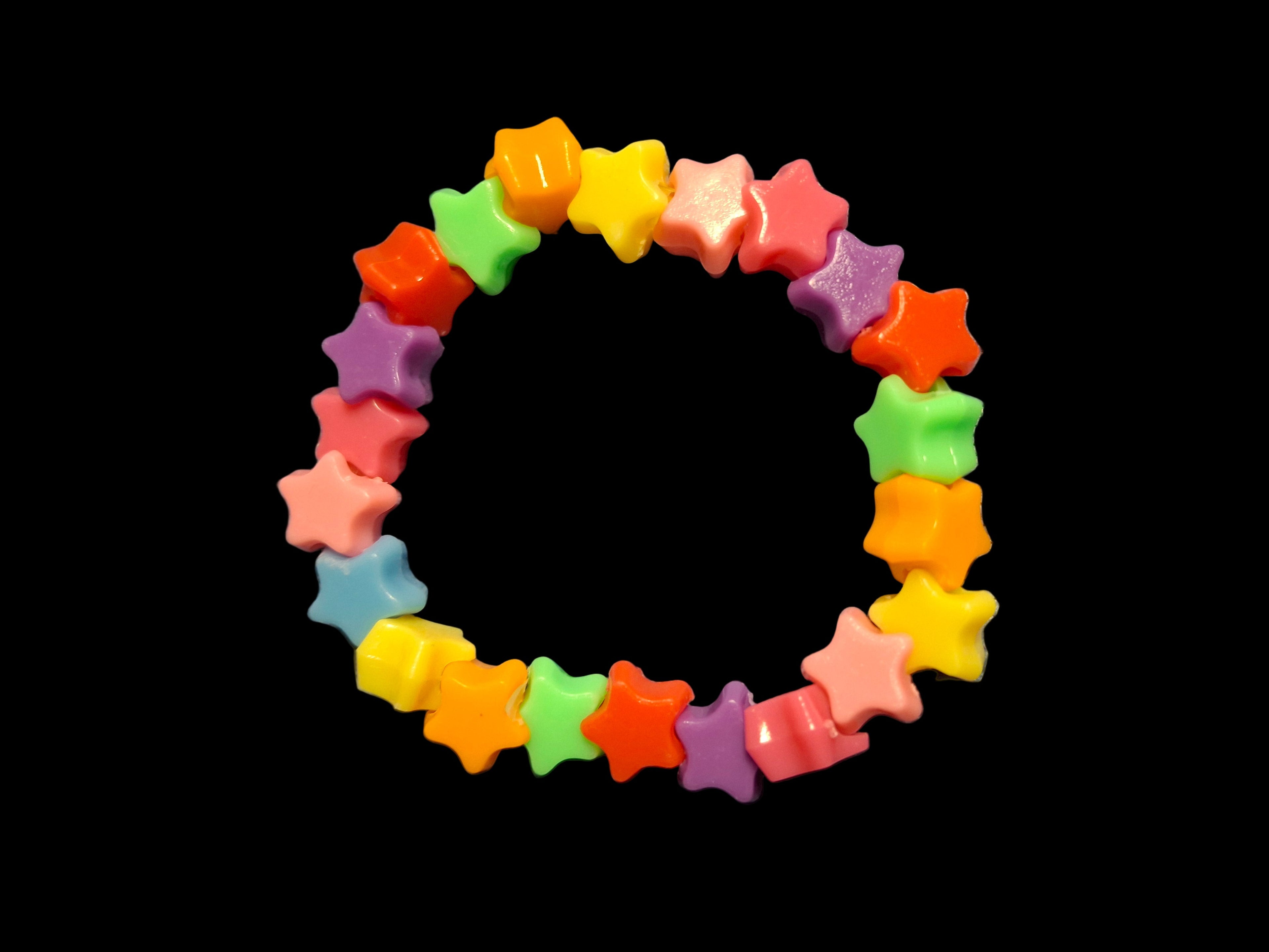 Colorful star-shaped bracelet on a black background